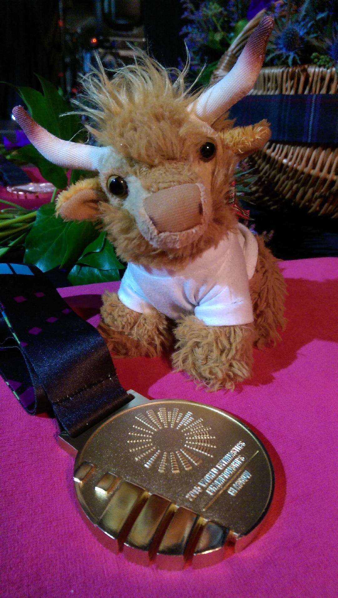 Medal and highland coo soft toy with World Gymnastics Championships 2015