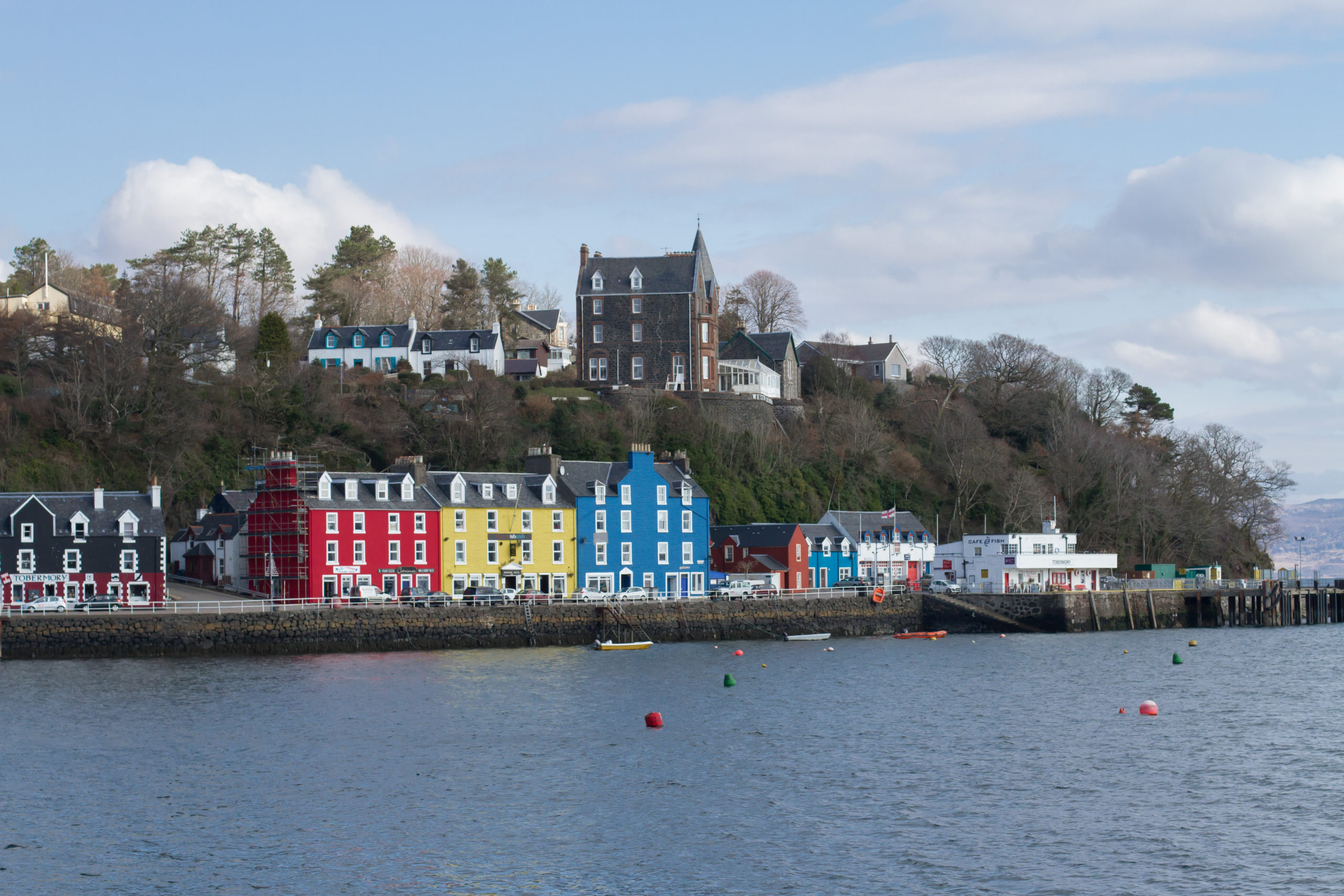 Photo of Tobermory, Mull. Brightly painted buildings along the harbour