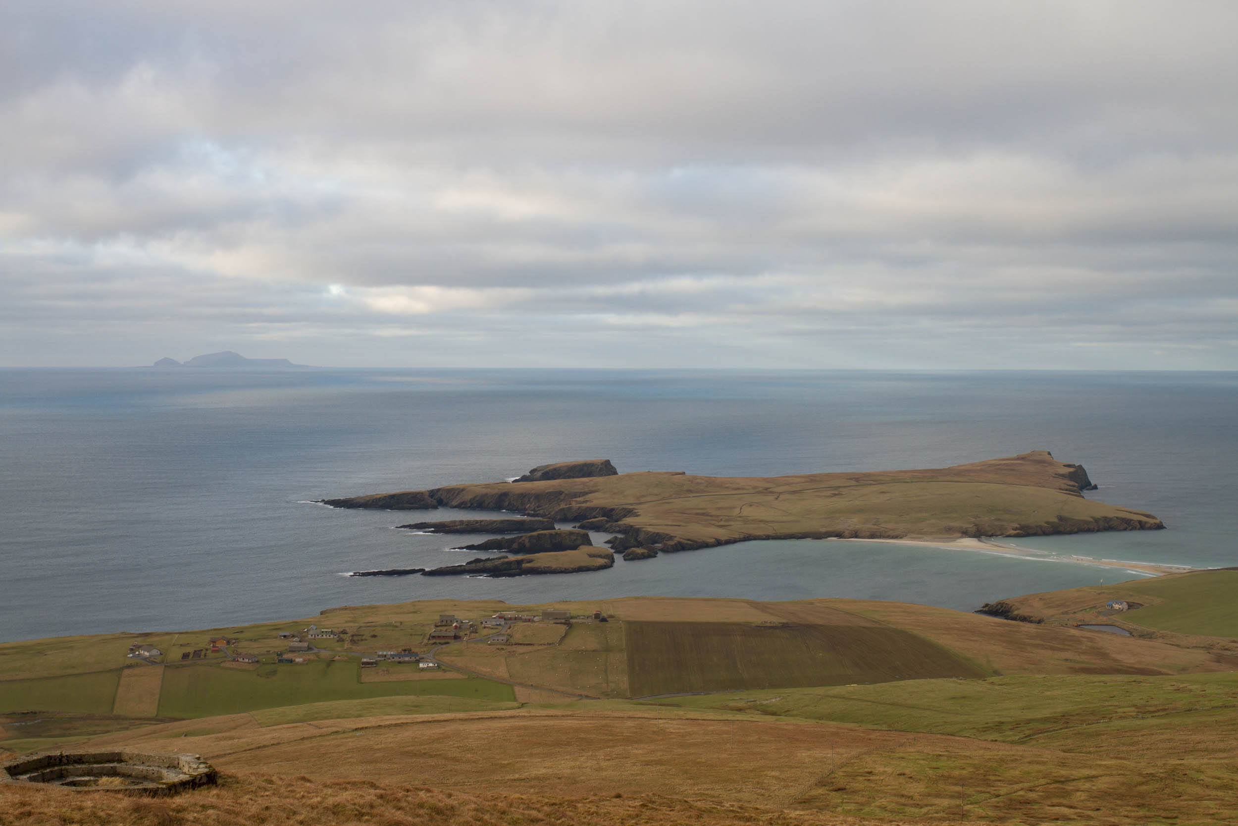 A photo of St Ninians, Tombolo, Shetland. A small island off the coast of Mainland Shetland. It has a small strip of sand running between Mainland and the island 