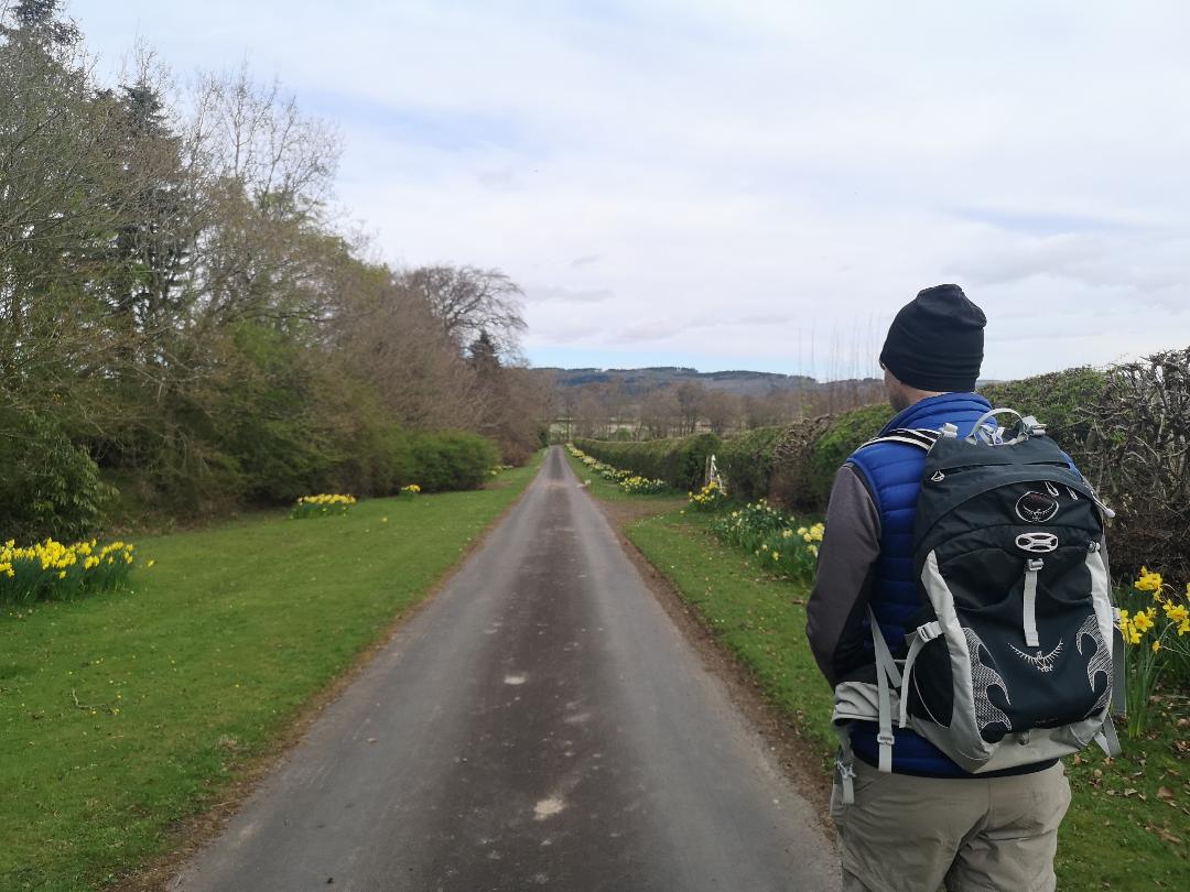 A man out walking wearing a backpack in Scotland - little walks from home during lockdown 