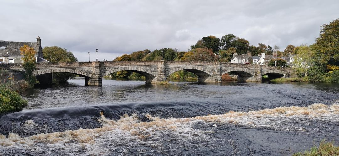 Image of a stone bridge and weir at Newton Stewart in Scotland 